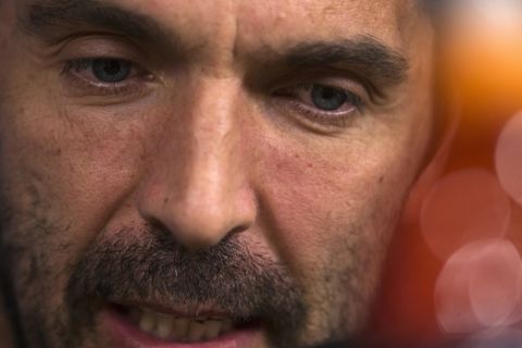 Juventus' goalkeeper Gianluigi Buffon answers a question during a news conference at the Santiago Bernabeu stadium in Madrid, Tuesday, April 10, 2018. Juventus will play a Champions League quarter final second leg soccer match with Real Madrid on Wednesday 11. (AP Photo/Francisco Seco)