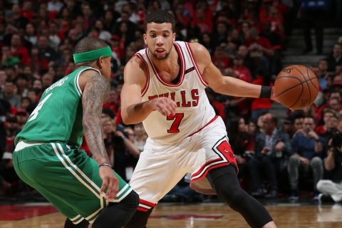 CHICAGO, IL - APRIL 21: Michael Carter-Williams #7 of the Chicago Bulls handles the ball against the Boston Celtics during Game Three of the Eastern Conference Quarterfinals of the 2017 NBA Playoffs on April 21, 2017 at the United Center in Chicago, Illinois. NOTE TO USER: User expressly acknowledges and agrees that, by downloading and or using this Photograph, user is consenting to the terms and conditions of the Getty Images License Agreement. Mandatory Copyright Notice: Copyright 2017 NBAE (Photo by Gary Dineen/NBAE via Getty Images)