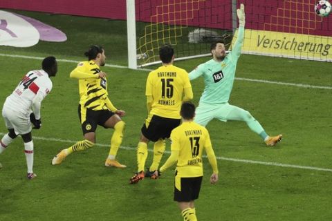 Stuttgart's Silas Wamangituka scores during the German Bundesliga soccer match between Borussia Dortmund and VfB Stuttgart in Dortmund, Germany, Saturday, Dec.12, 2020.  (Focke Strangmann/Pool via AP)