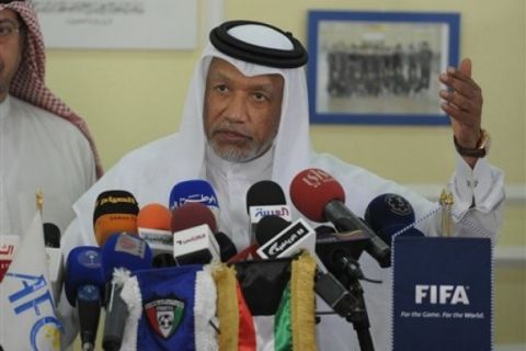 President of the Asian Football Confederation, Mohammed Bin Hammam talks to journalists during a press conference in Kuwait City on Sunday, May 8, 2011.   The president of Kuwait Football Federation Sheikh Talal Al Fahad Al Sabah has pledged the support of his organization in the Qatari's citizen bid to run against current FIFA president Sepp Blatter for the presidency which will be decided at the FIFA House in Zurich during the 61st FIFA congress. (AP Photo/Gustavo Ferrari)