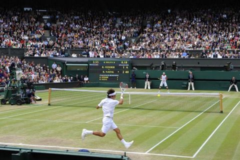 Wimbledon 2008, Day Thirteen. 06/7/08. Pic: Tom Jenkins.
The Mens Singles Final. Roger Federer v Rafael Nadal.
Federer running forehand in 1st set.