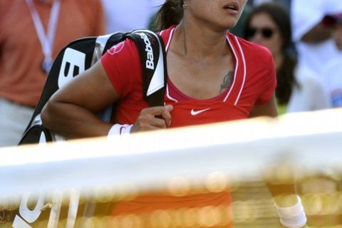 Na Li (6) of China after loosing to  Simona Halep of Romania   during the Women's  US Open 2011 match at the USTA Billie Jean King National Tennis Center in New York  August 30,2011.    AFP PHOTO / TIMOTHY A. CLARY (Photo credit should read TIMOTHY A. CLARY/AFP/Getty Images)