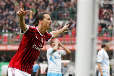 AC Milan forward Zlatan Ibrahimovic, of Sweden, celebrates after scoring during a Serie A soccer match between AC Milan and Catania at the San Siro stadium in Milan, Italy, Sunday, Nov. 6, 2011. (AP Photo/Luca Bruno)