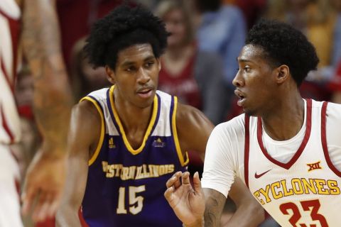 Iowa State forward Zoran Talley Jr., right, drives past Western Illinois guard Dalan Ancrum, left, during the second half of an NCAA college basketball game, Saturday, Nov. 25, 2017, in Ames, Iowa. (AP Photo/Charlie Neibergall)