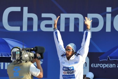 Greece's bronze medalist Ioannis Drymonakos waves before the men's 200m butterfly final at the European Swimming Championships in Budapest on August 12, 2010.  AFP PHOTO / JOE KLAMAR (Photo credit should read JOE KLAMAR/AFP/Getty Images)