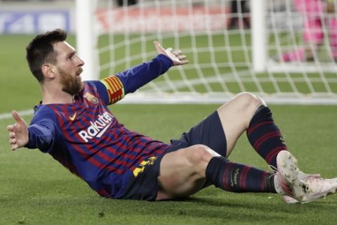 Barcelona's Lionel Messi celebrates after scoring his side's third goal during the Champions League semifinal, first leg, soccer match between FC Barcelona and Liverpool at the Camp Nou stadium in Barcelona, Spain, Wednesday, May 1, 2019. (AP Photo/Emilio Morenatti)