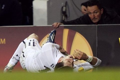 Tottenham Hotspur's Gareth Bale lies injured