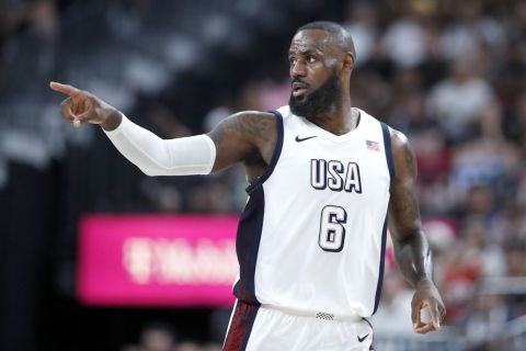 United States forward LeBron James (6) celebrates after scoring a basket against Canada during the second half of an exhibition basketball game Wednesday, July 10, 2024, in Las Vegas. (AP Photo/Steve Marcus)