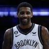 Brooklyn Nets' Kyrie Irving plays during an NBA basketball game, Wednesday, Jan. 25, 2023, in Philadelphia. (AP Photo/Matt Slocum)