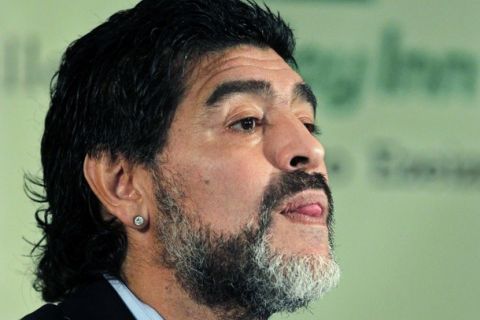 Argentina soccer great Diego Maradona arrives to read a statement in Buenos Aires in this July 28, 2010 file photo. Maradona was named head coach of Dubai's Al Wasl Sport Club on May 16, 2011, in a two-season contract. REUTERS/Enrique Marcarian (ARGENTINA - Tags: SPORT SOCCER)