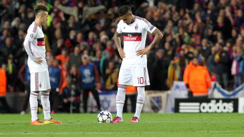 AC Milan's forward Stephan  El Shaarawy (L) and AC Milan's Ghanaian defender Prince Kevin Boateng (R) react during the UEFA Champions League round of 16 second leg football match FC Barcelona against AC Milan at Camp Nou stadium in Barcelona on March 12, 2013.  AFP PHOTO / QUIQUE GARCIA        (Photo credit should read QUIQUE GARCIA/AFP/Getty Images)