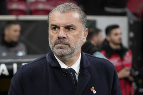 Tottenham's head coach Ange Postecoglou watches during the Europa League opening phase soccer match between Galatasaray and Tottenham Hotspur at Ali Sami Yen stadium, in Istanbul, Turkey, Thursday, Nov. 7, 2024. (AP Photo/Khalil Hamra)