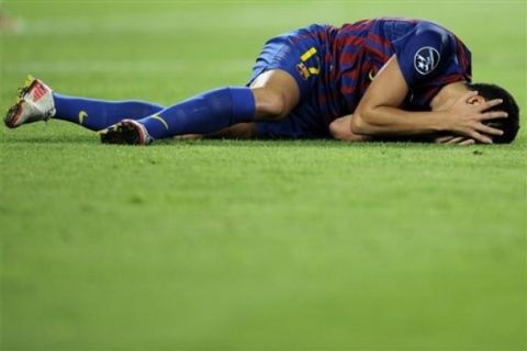 FC Barcelona's Ibrahim Afellay, from The Netherlands reacts during his group H Champions League soccer match against AC Milan at the Camp Nou stadium, in Barcelona, Spain, Tuesday, Sept. 13, 2011. (AP Photo/Daniel Ochoa de Olza)