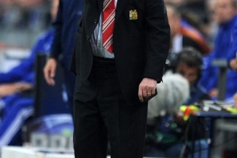 Manchester's manager Alex Ferguson gestures during the Champions League semi-final, first-leg match of Schalke 04 against Manchester United on April 26, 2011 in Gelsenkirchen, western Germany. Manchester United won the match 0-2. AFP PHOTO / PATRIK STOLLARZ (Photo credit should read PATRIK STOLLARZ/AFP/Getty Images)