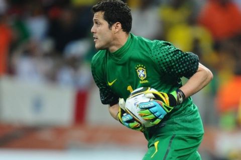 Brazil's goalkeeper Julio Cesar makes a save during the 2010 World Cup quarter-final football match Netherlands vs. Brazil on July 2, 2010 at Nelson Mandela Bay stadium in Port Elizabeth.  NO PUSH TO MOBILE / MOBILE USE SOLELY WITHIN EDITORIAL ARTICLE -        AFP PHOTO / FRANCOIS-XAVIER MARIT (Photo credit should read FRANCOIS-XAVIER MARIT/AFP/Getty Images)