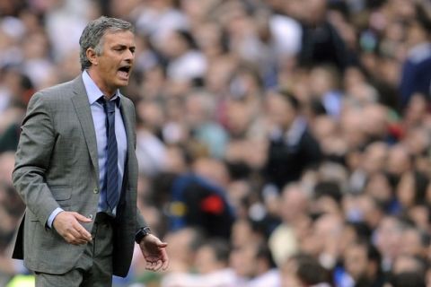 Real Madrid's Portuguese coach Jose Mourinho reacts during the Spanish League football match Real Madrid vs  Sporting Gijon on April 2, 2011 at the Santiago Bernabeu stadium in Madrid. Sporting Gijon won 0-1.   AFP PHOTO/ DOMINIQUE FAGET (Photo credit should read DOMINIQUE FAGET/AFP/Getty Images)