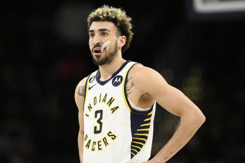 Indiana Pacers guard Chris Duarte (3) looks on during the second half of an NBA basketball game against the Washington Wizards, Saturday, Feb. 11, 2023, in Washington. (AP Photo/Nick Wass)