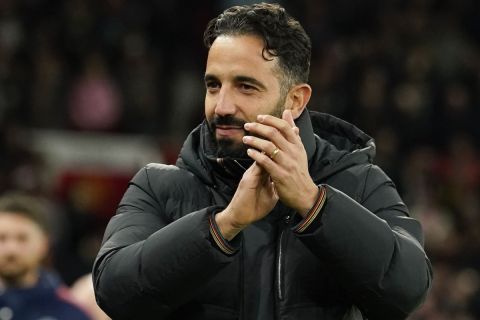 Manchester United's head coach Ruben Amorim applauds to supporters prior the Europa League opening phase soccer match between Manchester United and Bodo Glimt, at the Old Trafford stadium in Manchester, England, Thursday, Nov. 28, 2024. (AP Photo/Dave Thompson)