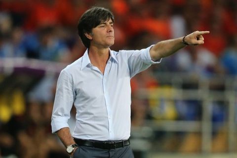 KHARKOV, UKRAINE - JUNE 13:  Head Coach Joachim Loew of Germany gestures during the UEFA EURO 2012 group B match between Netherlands and Germany at Metalist Stadium on June 13, 2012 in Kharkov, Ukraine.  (Photo by Joern Pollex/Getty Images)