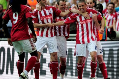 LONDON, ENGLAND - APRIL 17:  Jonathan Walters (R) of Stoke celebrates with his team scoring the fourth goal during the FA Cup sponsored by E.ON semi final match between Bolton Wanderers and Stoke City at Wembley Stadium on April 17, 2011 in London, England.  (Photo by Jamie McDonald/Getty Images)