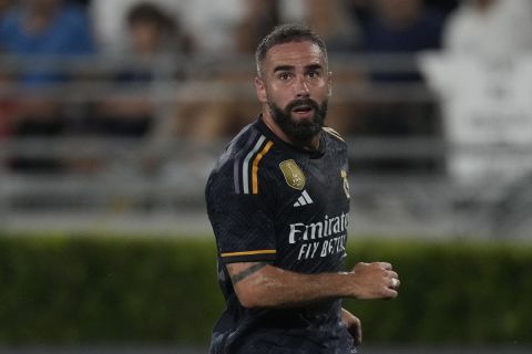 Real Madrid FC defender Daniel Carvajal (2) looks up during a Soccer Champions Tour exhibition match against AC Milan, Sunday, July 23, 2023, in Pasadena, Calif. (AP Photo/Ashley Landis)