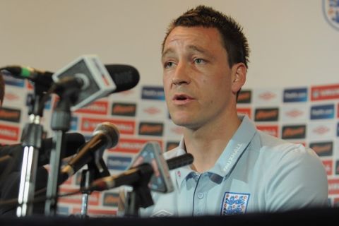 ST ALBANS, ENGLAND - MARCH 22:  John Terry speaks to the media during the England press conference training session ahead of their UEFA EURO 2012 qualifier against Wales, at London Colney on March 22, 2011 in St Albans, England.  (Photo by Michael Regan/Getty Images)