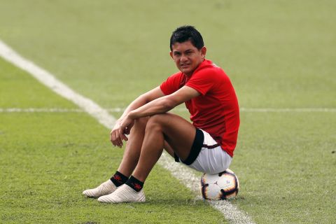 Luis Miguel Rodriguez, of Argentina's Colon soccer team, sits on the ball during a training session at Olimpia Stadium in Asuncion, Paraguay, Friday, Nov. 8, 2019. Colon will play Ecuador's Independiente del Valle on Saturday, the final Copa Sudamericana match. (AP Photo/Jorge Saenz)