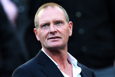 FILE - In this Oct. 16, 2011 file photo, Paul Gascoigne, is seen at the English Premier League soccer match between Newcastle United and Tottenham Hotspurs at St James' Park, Newcastle, England. According to news reports published Sunday March 10, 2013, Gascoigne says he's back from brink of death after receiving treatment for alcoholism in USA. The 45-year-old Gascoigne flew back home on Saturday, a month after being admitted to the intensive care unit of a hospital in Phoenix, USA, following a relapse in his long-running struggle with alcoholism. (AP Photo/Scott Heppell, File)