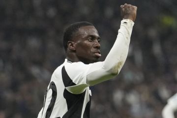 Juventus' Timothy Weah celebrates after scoring his side's second goal during a Serie A soccer match between Inter Milan and Juventus at the San Siro stadium in Milan, Italy, Sunday, Oct. 27, 2024. (AP Photo/Luca Bruno)