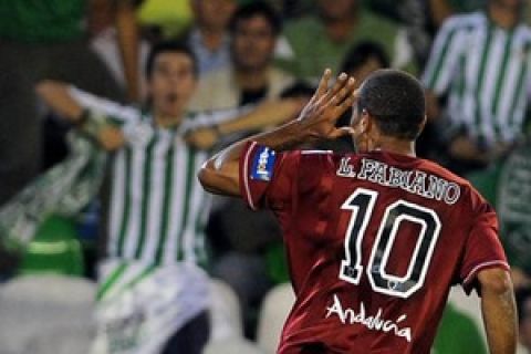 Sevilla's Luis Fabiano celebrates after scoring against Betis during a derby football match at the Ruiz de Lopera stadium in Seville, on May 11, 2008.AFP PHOTO/ CRISTINA QUICLER (Photo credit should read CRISTINA QUICLER/AFP/Getty Images)