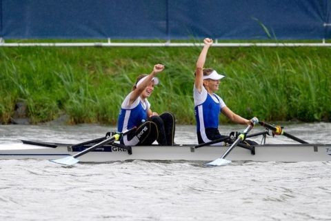 AMSTERDAM, NETHERLANDS - JULY 24: Triantafylia Kalampoka and Christina Giazitzidou of Greece celebrate winning the Lightweight Women's Double Sculls during Day Five of the FISA World Rowing Under 23 Championships 2011 on the Bosbaan on July 24, 2011 in Amsterdam, Netherlands. (Photo by Olaf Kraak/Getty Images)