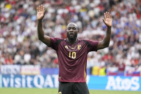 Belgium's Romelu Lukaku gestures during a Group E match between Belgium and Slovakia at the Euro 2024 soccer tournament in Frankfurt, Germany, Monday, June 17, 2024. (AP Photo/Darko Vojinovic)