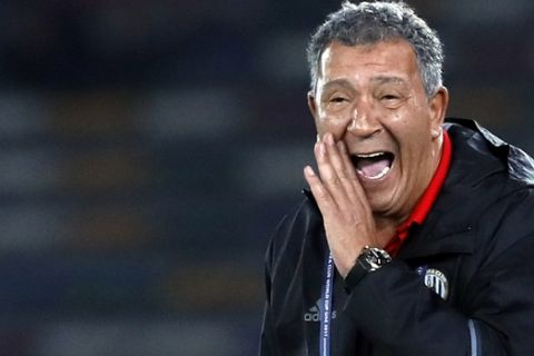 Al Jazira's head coach Henk Ten Cate gives directions to his players during the Club World Cup soccer match between Al Jazira Club and Urawa Reds at Zayed sport city in Abu Dhabi, United Arab Emirates, Saturday, Dec. 9, 2017. (AP Photo/Hassan Ammar)