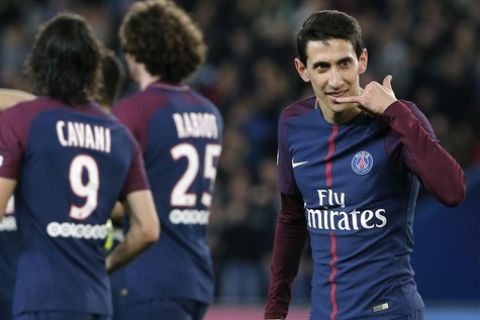 PSG's Angel Di Maria, right, celebrates scoring his side's fifth goal during the French League One soccer match between Paris Saint Germain and Monaco at the Parc des Princes stadium in Paris, Sunday, April 15, 2018. (AP Photo/Thibault Camus)