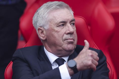 Real Madrid head coach Carlo Ancelotti gestures during the Champions League soccer final between Borussia Dortmund and Real Madrid at Wembley stadium in London, Saturday, June 1, 2024. (AP Photo/Ian Walton)