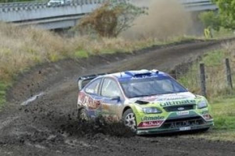 In this photo supplied by Rally Australia, Finland's Jari-Matti Latvala controls his car on a bend during the Australia Rally in Murwillumbah in outback New South Wales Saturday, Sept. 5, 2009. Finland's Mikko Hirvonen leads the field after the second day racing ahead of Spaniard Dani Sordo and  Frances Sebastien Loeb. (AP Photo/Jeremy Rogers) ** No Sales, Editorial Use Only **