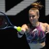 Maria Sakkari of Greece plays a forehand return to Yuan Yue of China during their first round match at the Australian Open tennis championship in Melbourne, Australia, Monday, Jan. 16, 2023. (AP Photo/Aaron Favila)