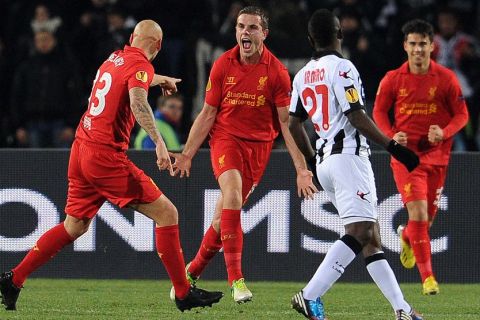 Liverpool's Jordan Henderson (C) celebrates after scoring during the UEFA Europa League football match between Udinese and Liverpool on December 6, 2012 at Friuli Stadium in Udine. AFP PHOTO / SIMONE FERRARO        (Photo credit should read SIMONE FERRARO //AFP/Getty Images)