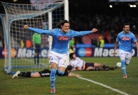 Napoli's Huruguayan forward Edinson Roberto Cavani celebrates after scoring against  Chelsea the Champions League round of 16 first leg football match, Napoli vs Chelsea at San Paolo stadium in Naples on February 21, 2012. Napoli defeated Chelsea 3-1.    AFP PHOTO / ANDREAS SOLARO (Photo credit should read ANDREAS SOLARO/AFP/Getty Images)