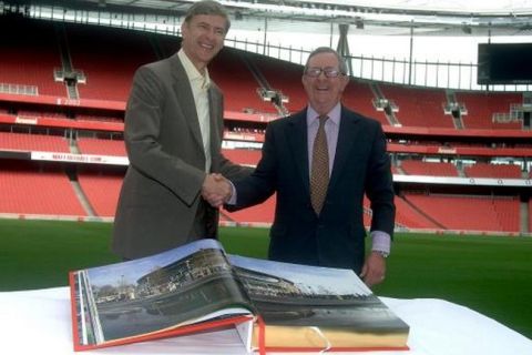 Arsene Wenger and chairman of Arsenal Peter Hill-Wood during a photo call at the Emirates Stadium, London, were the launch of the exclusive Arsenal Opus book the limited edition Arsenal Opus tells the story of Arsenal football club focussing on the Highbury years from 1913 to 2006.