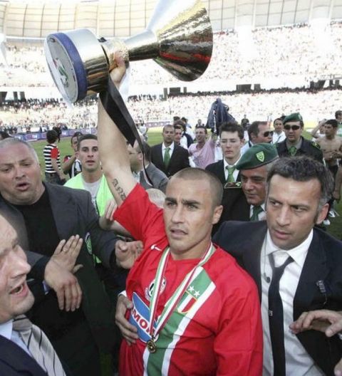 BARI, ITALY - MAY 14: Fabio Cannavaro of Juventus holds up the title trophy after the Serie A match between Reggina and Juventus at the Stadio Granillo on May 14, 2006 in Bari, Italy. (Photo by New Press/Getty Images)