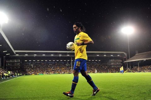 Brazil's midfielder Ronaldinho prepares to take a corner during during the international friendly football match between Brazil and Ghana, at the Craven Cottage in London, on September 5, 2011. AFP PHOTO/GLYN KIRK (Photo credit should read GLYN KIRK/AFP/Getty Images)