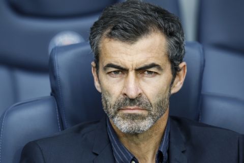 Bastia's coach Rui Almeida sits on the bench before the French League One soccer match between PSG and Bastia at the Parc des Princes stadium in Paris, France, Saturday, May 6, 2017. (AP Photo/Kamil Zihnioglu)