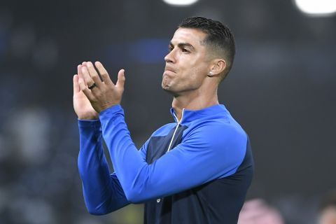 Al Nassr's Cristiano Ronaldo greets his fans during Riyadh Season Cup 2024 final match against Al Hilal at Kingdom Arena Stadium in Riyadh, Saudi Arabia, Thursday, Feb. 8, 2024. (AP Photo)