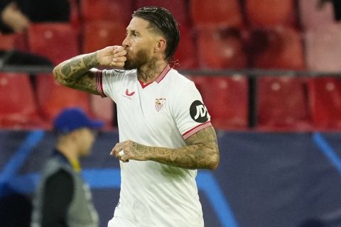 Sevilla's Sergio Ramos celebrates after scoring his side's first goal during the Champions League Group B soccer match between Sevilla and PSV at the Ramon Sanchez-Pizjuan stadium in Seville, Spain, Wednesday, Nov.29, 2023. (AP Photo/Jose Breton)