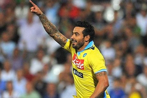 Argentinian forward of Ssc Napoli, Ezequiel Lavezzi, jubilates after scoring the goal aginst Ac Cesena during their Italian Serie A soccer match at Dino Manuzzi stadium in Cesena on 10 September 2011.
ANSA/PASQUALE BOVE