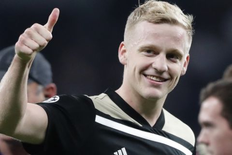 Ajax's Donny van de Beek, who scored his side's only goal, flashes a thumbs up after winning the Champions League semifinal first leg soccer match between Tottenham Hotspur and Ajax with a 1-0 score at the Tottenham Hotspur stadium in London, Tuesday, April 30, 2019. (AP Photo/Frank Augstein)