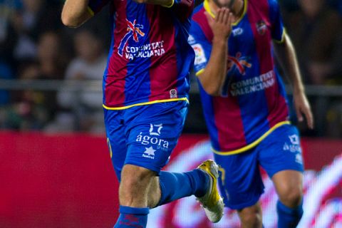 Levante's midfielder Juan Luis Gomez Lopez celebrates after scoring during the Spanish league football match between Levante and Villarreal on October 23, 2011, at the Madrigal stadium in Villarreal. AFP PHOTO/ Jaime REINA (Photo credit should read JAIME REINA/AFP/Getty Images)