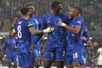 Chelsea's Axel Disasi, second right, celebrates with Chelsea's Christopher Nkunku after scoring his side's third goal during the Europa Conference League opening phase soccer match between Chelsea and FC Noah at Stamford Bridge stadium in London Thursday, Nov. 7, 2024. (AP Photo/Frank Augstein)