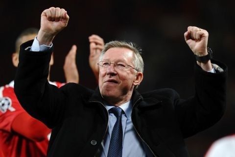 Manchester United manager Alex Ferguson celebrates as he leaves the pitch after a 4-1 victory during the UEFA Champions League semi-final second leg football match between Manchester United and FC Schalke at Old Trafford in Manchester, north-west England on May 4, 2011. AFP PHOTO/PAUL ELLIS (Photo credit should read PAUL ELLIS/AFP/Getty Images)